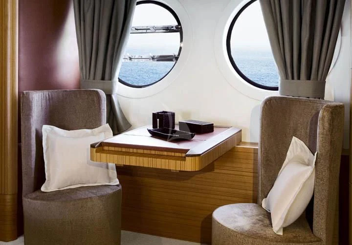 a room with a bed and a window aboard SICILIA IV Yacht for Sale