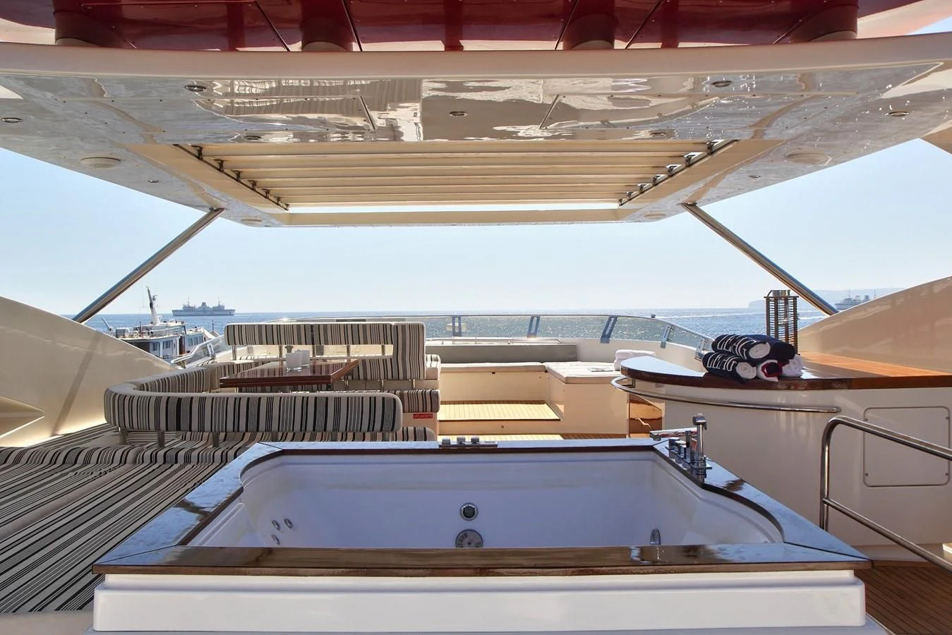 a large ship with a deck aboard SICILIA IV Yacht for Sale