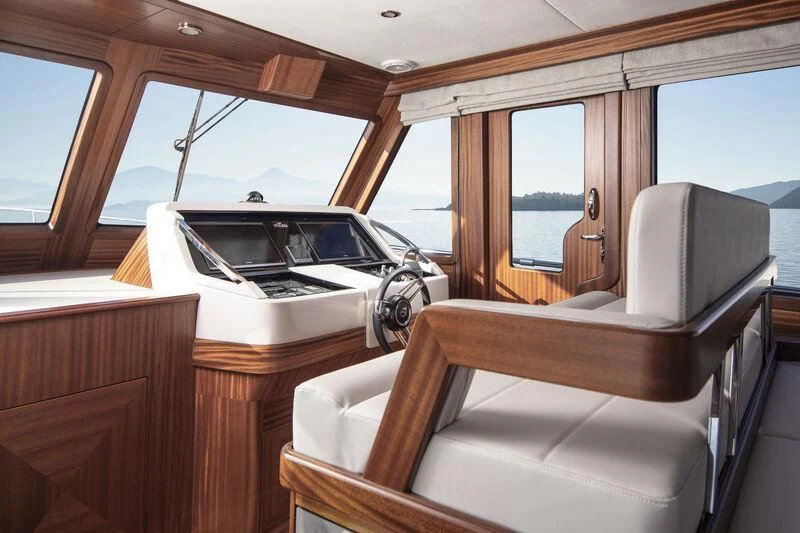 a car with a laptop on the dashboard aboard ALECTO Yacht for Sale
