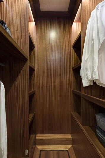 a wooden door with white curtains aboard ALECTO Yacht for Sale