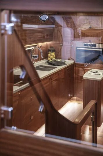 a bathroom with a sink and a mirror aboard ALECTO Yacht for Sale