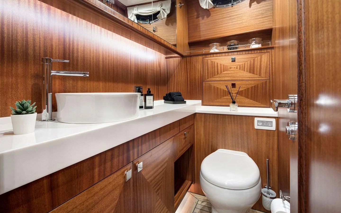 a bathroom with a toilet and sink aboard ALECTO Yacht for Sale