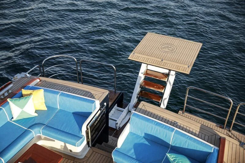 a boat with books on it aboard ALECTO Yacht for Sale