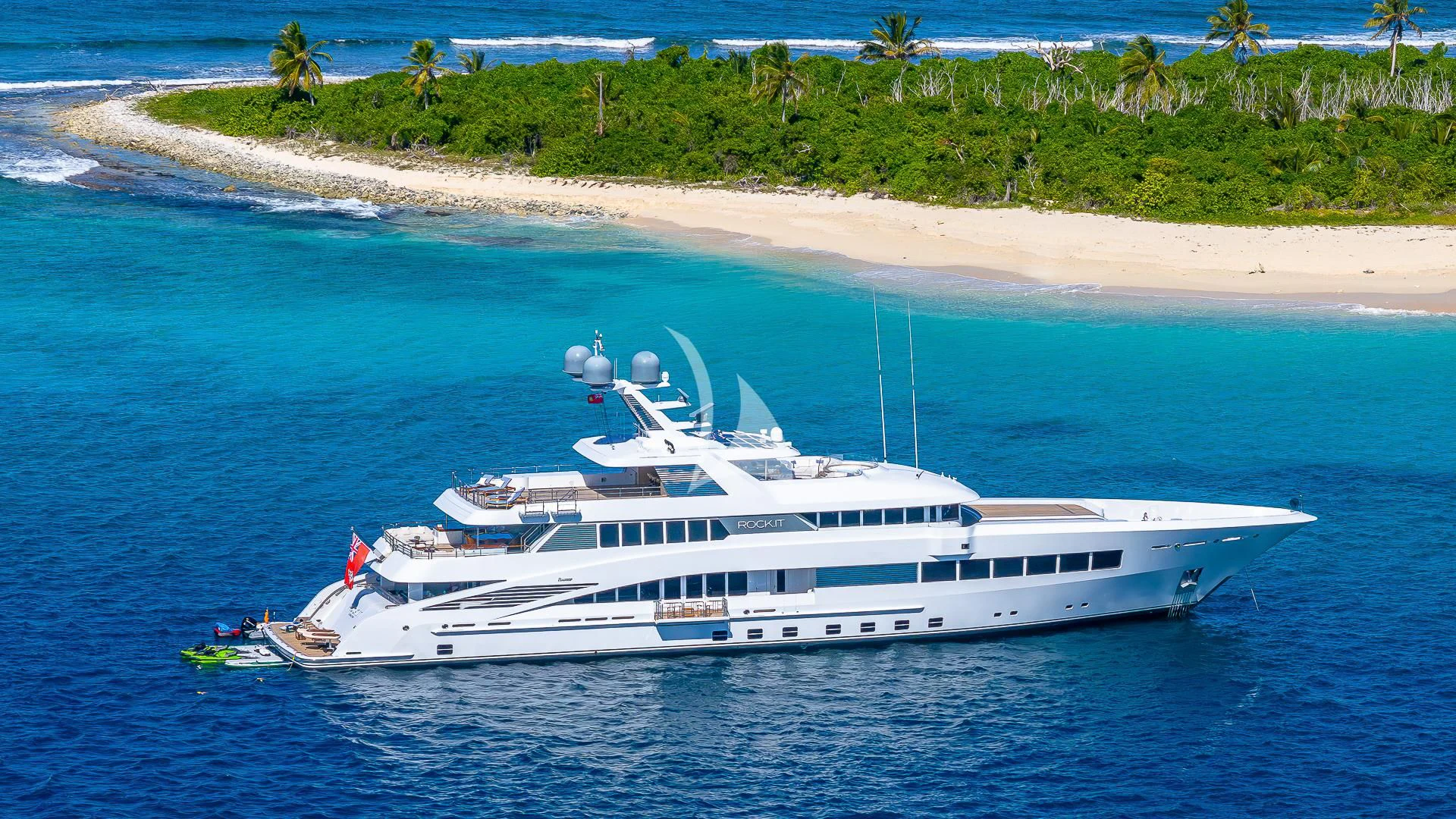 a white yacht on the water aboard ROCK.IT Yacht for Charter
