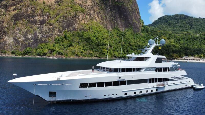 a white yacht on the water aboard ROCK.IT Yacht for Charter
