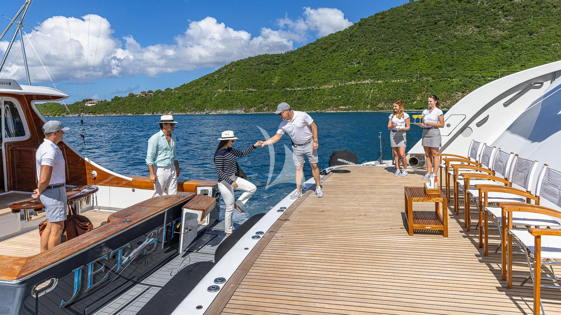 a group of people on a dock aboard ROCK.IT Yacht for Charter