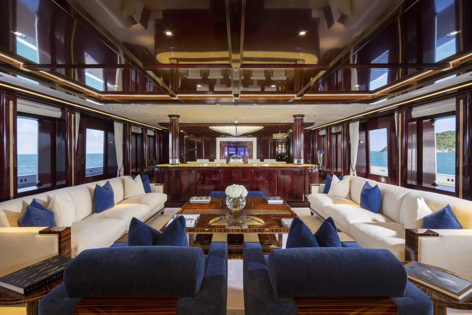 a room with a couch and a table aboard ROCK.IT Yacht for Charter