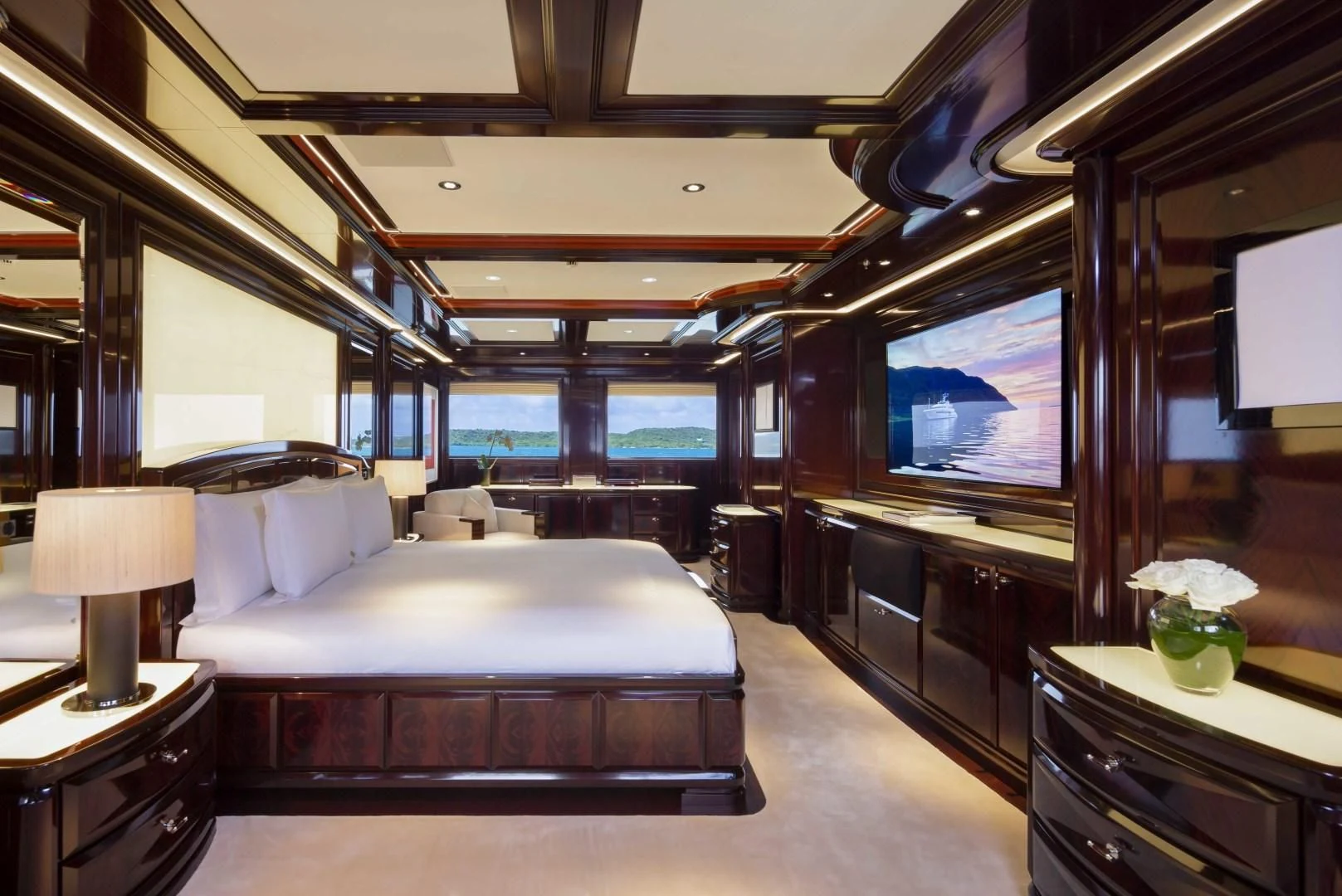 a hotel room with a large bed aboard ROCK.IT Yacht for Charter