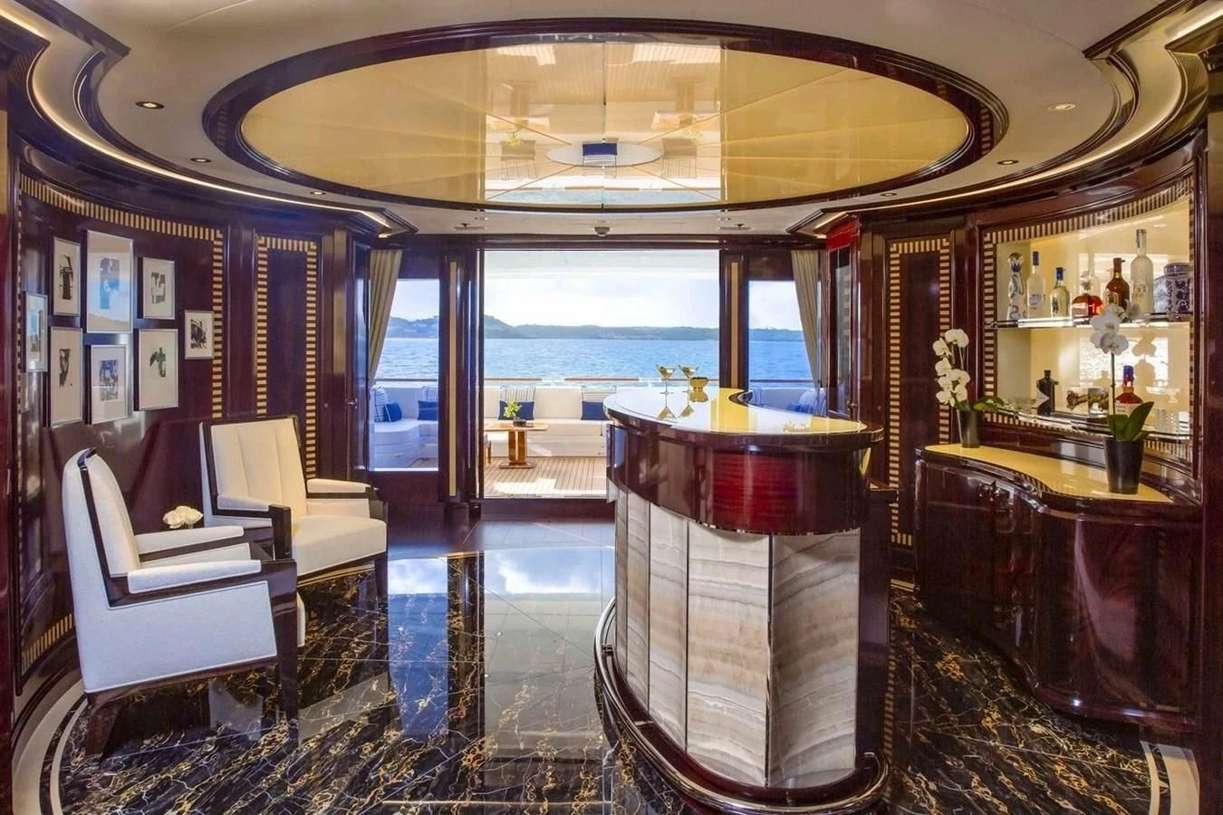 a room with a table and chairs aboard ROCK.IT Yacht for Charter