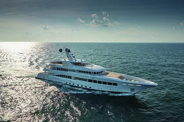 a white yacht on the beach aboard ROCK.IT Yacht for Charter