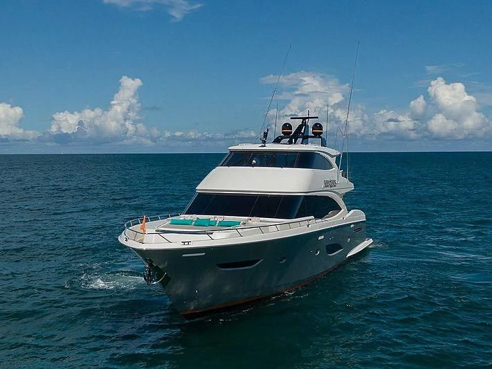a boat in the water aboard OBSESSION Yacht for Sale