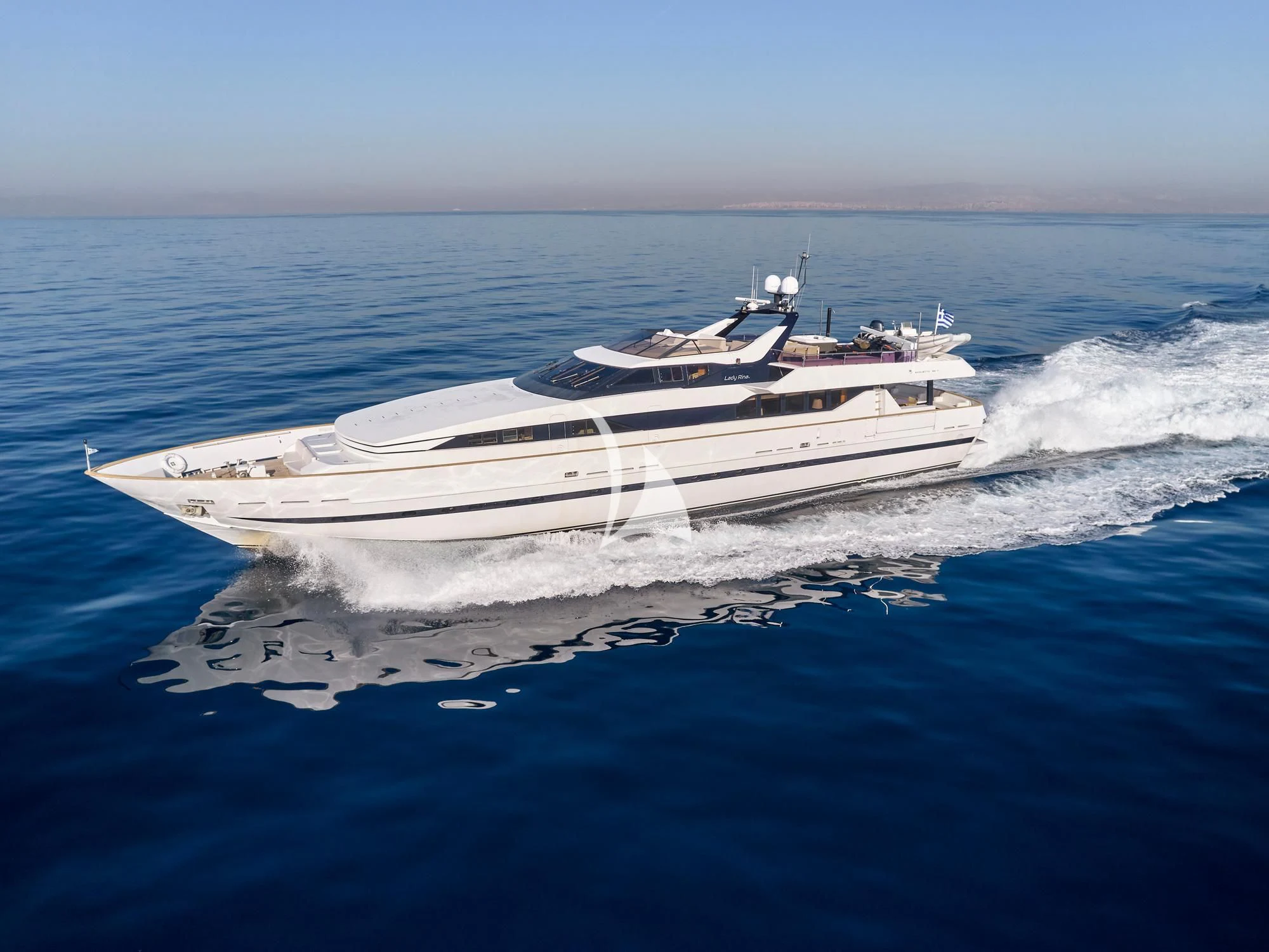 a white boat on the water aboard LADY RINA Yacht for Sale