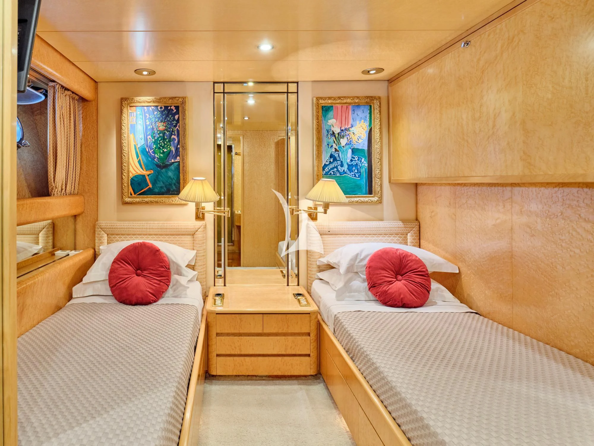 a room with a bed and a mirror aboard LADY RINA Yacht for Sale