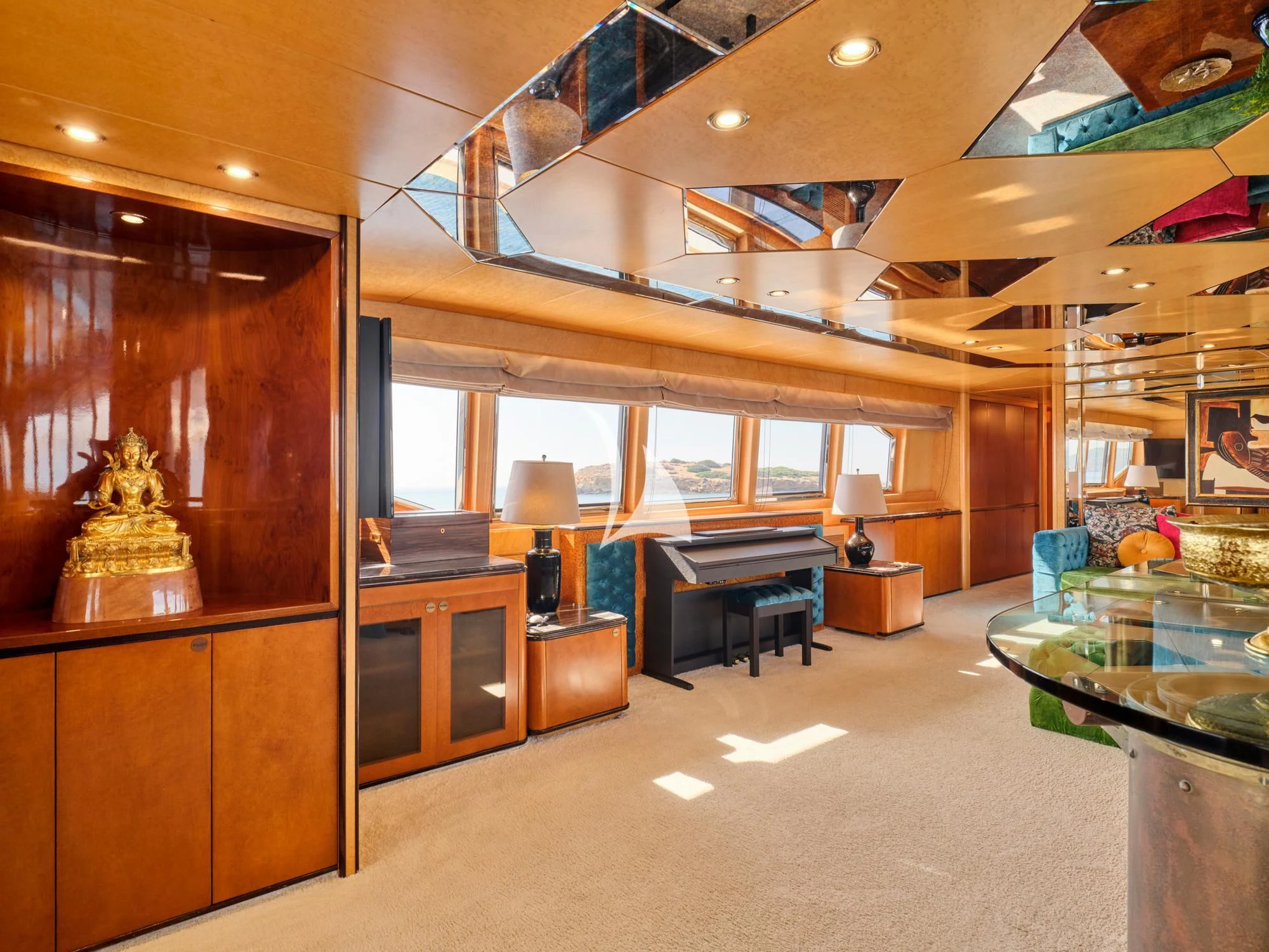 a room with a desk and a lamp aboard LADY RINA Yacht for Sale
