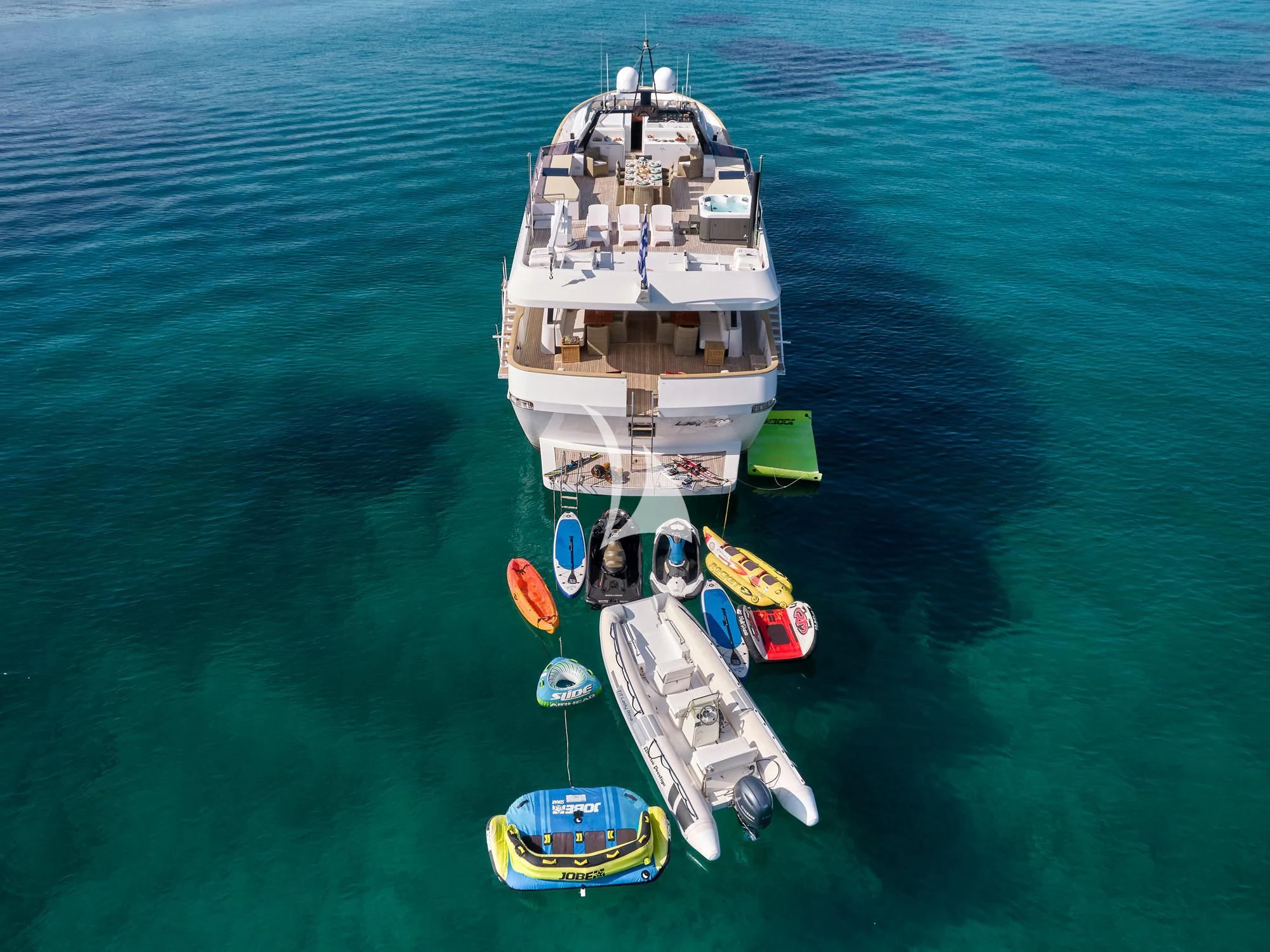 a large ship in the water aboard LADY RINA Yacht for Sale