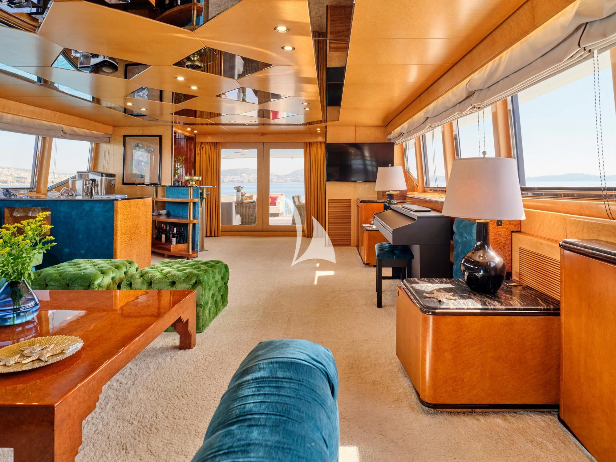 a living room with a large window aboard LADY RINA Yacht for Sale