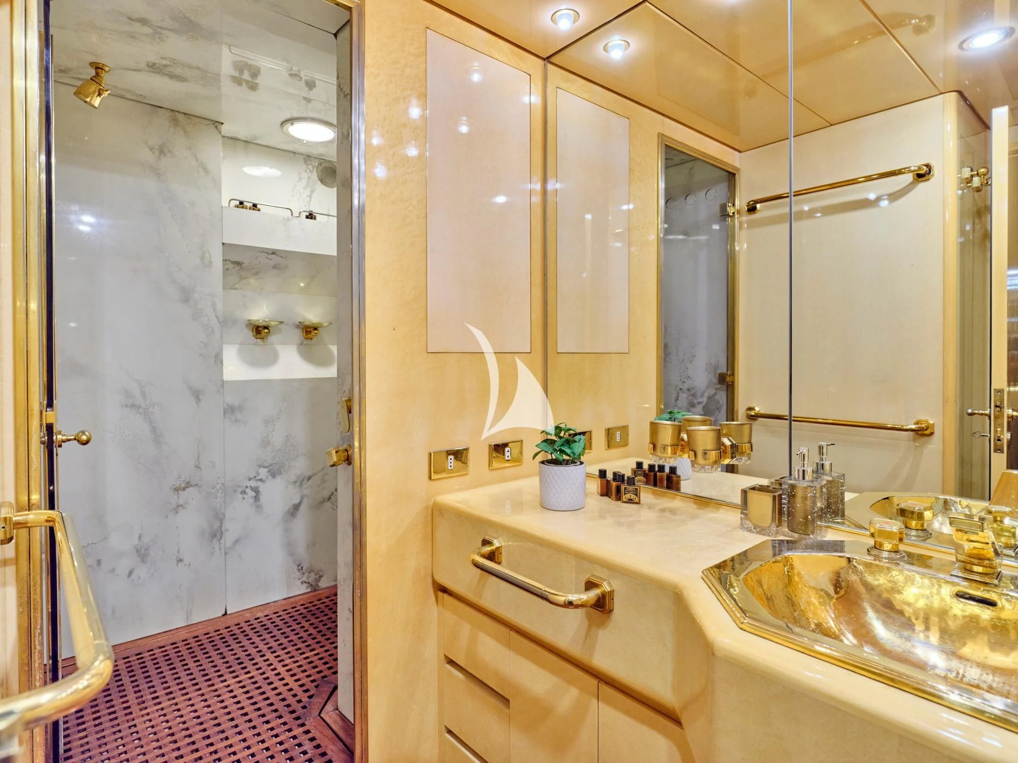 a bathroom with a sink and a mirror aboard LADY RINA Yacht for Sale