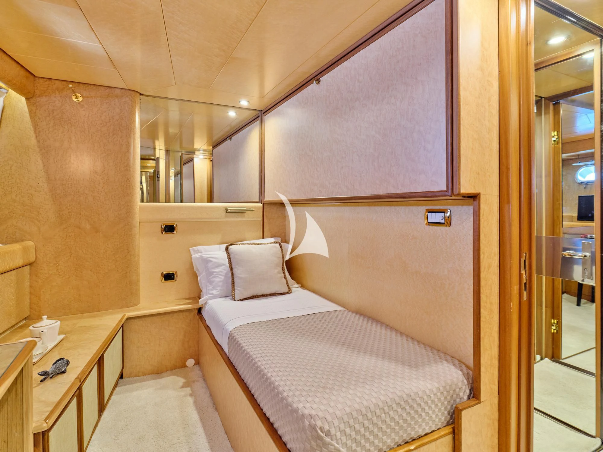 a room with a bed and a desk aboard LADY RINA Yacht for Sale