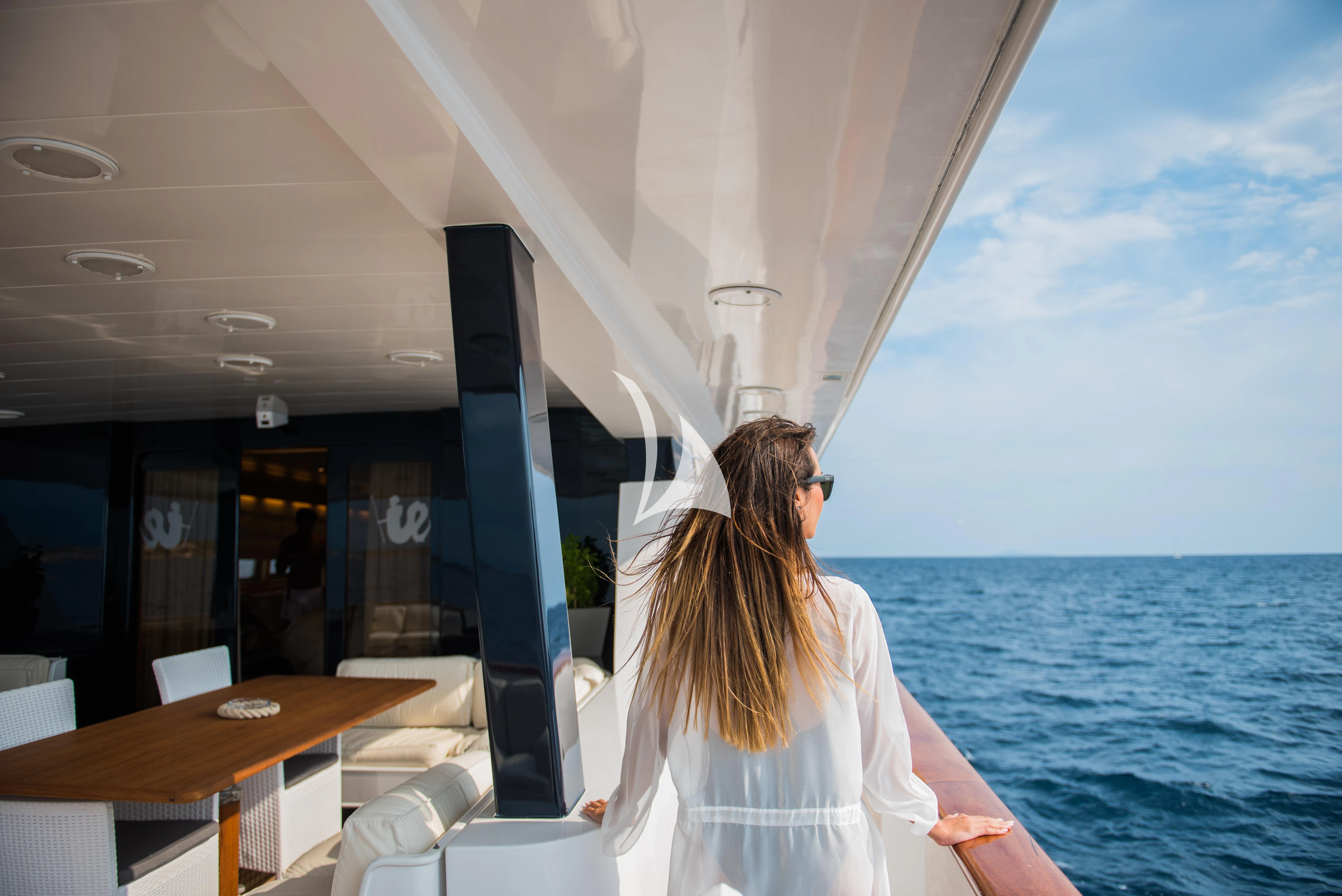 a person sitting on a boat aboard LADY RINA Yacht for Sale