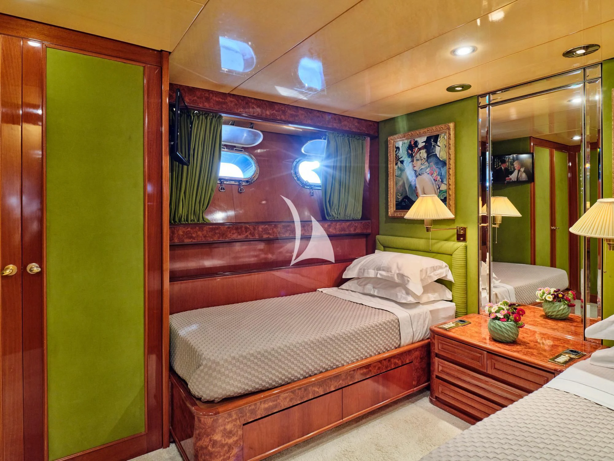 a room with a bed and a mirror aboard LADY RINA Yacht for Sale