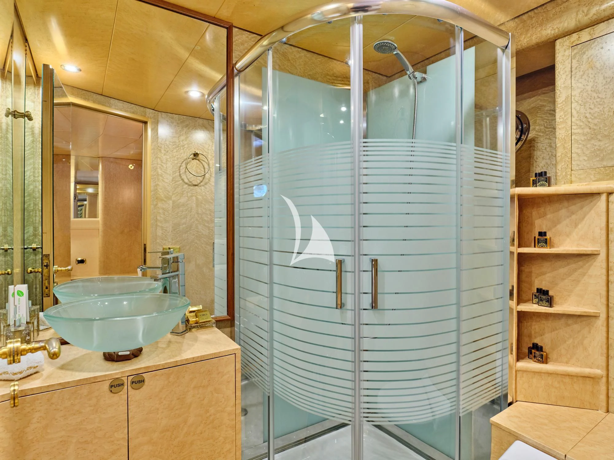 a bathroom with a glass shower aboard LADY RINA Yacht for Sale