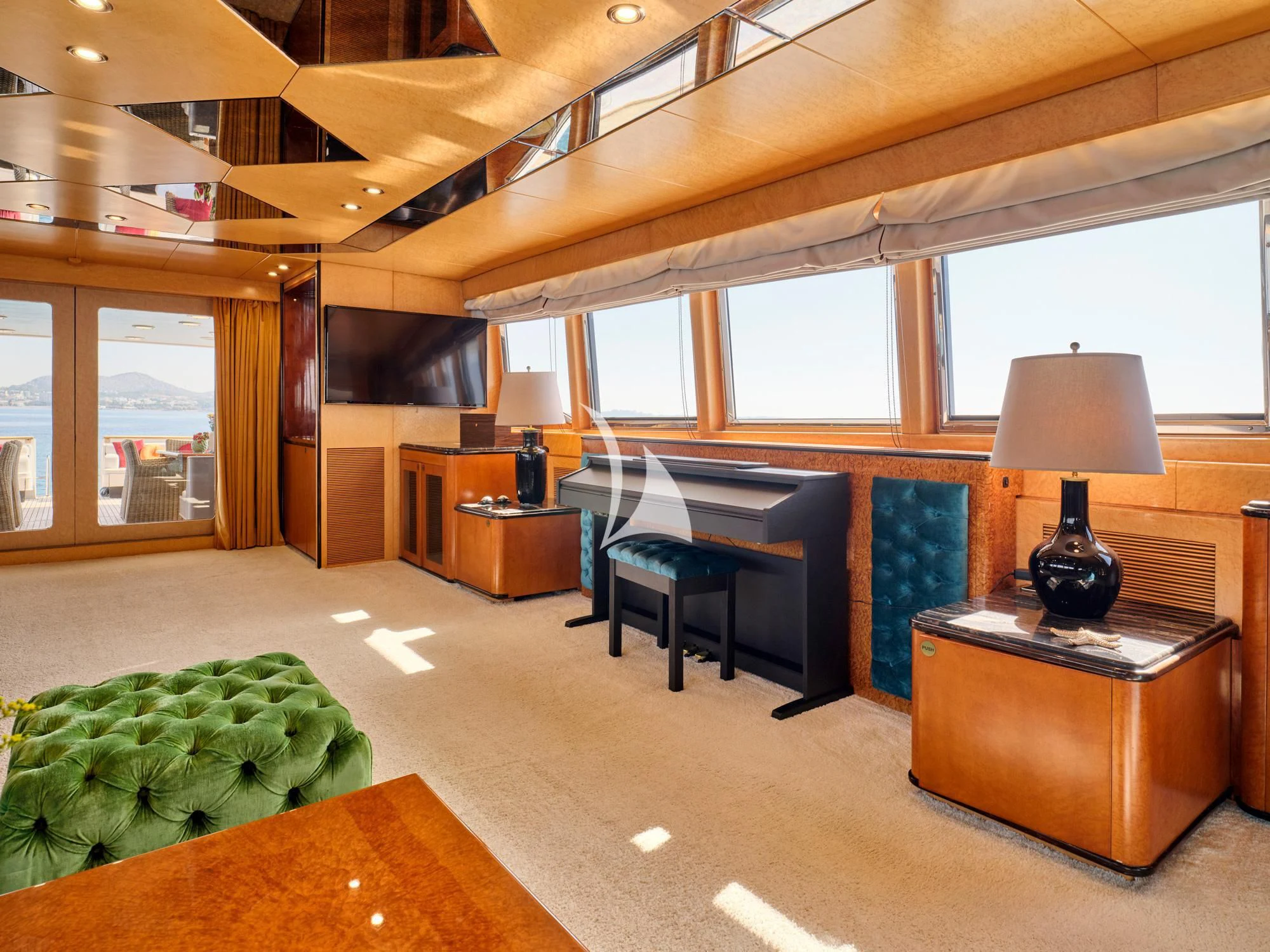 a living room with a large window aboard LADY RINA Yacht for Sale