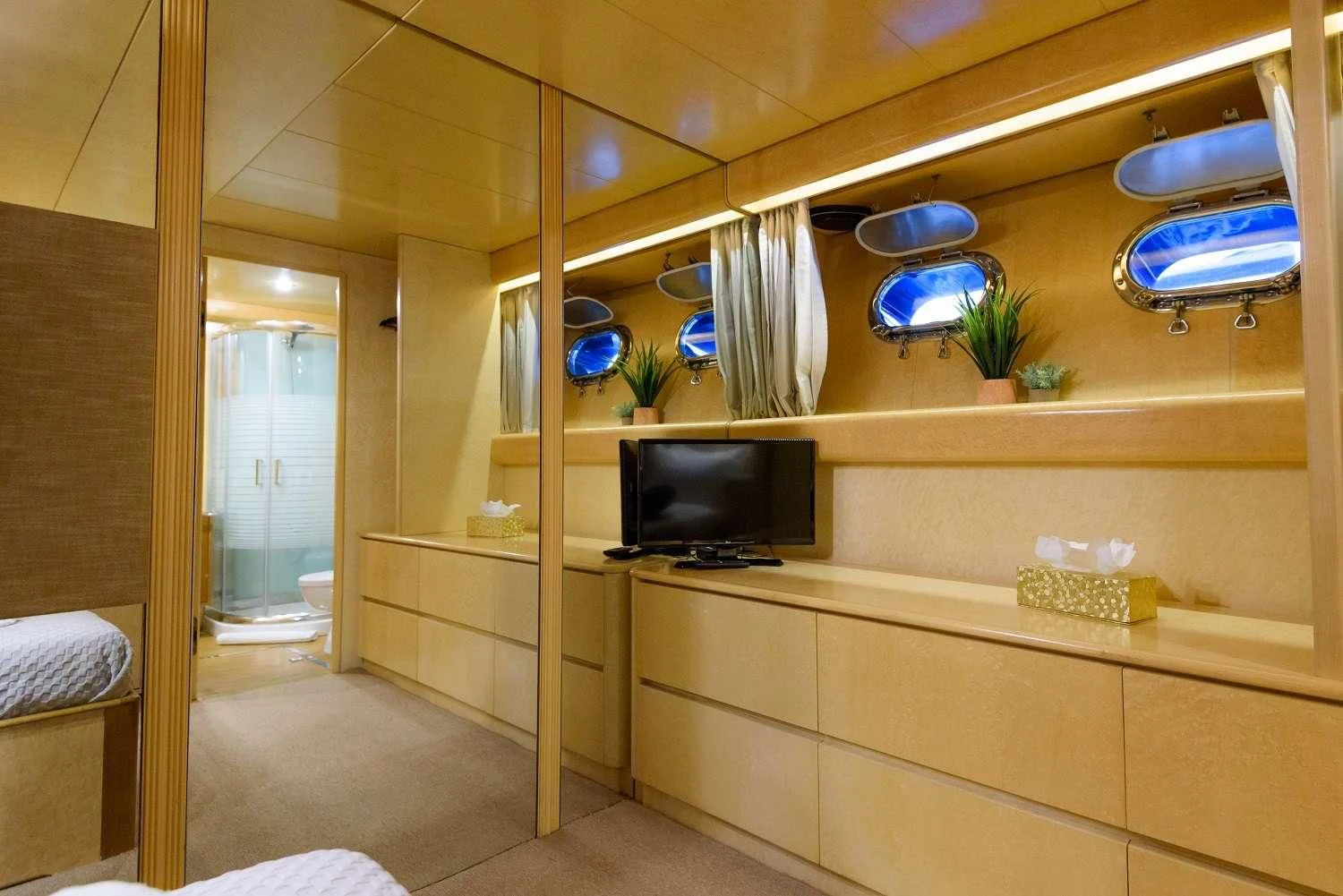 a bathroom with a glass door aboard LADY RINA Yacht for Sale