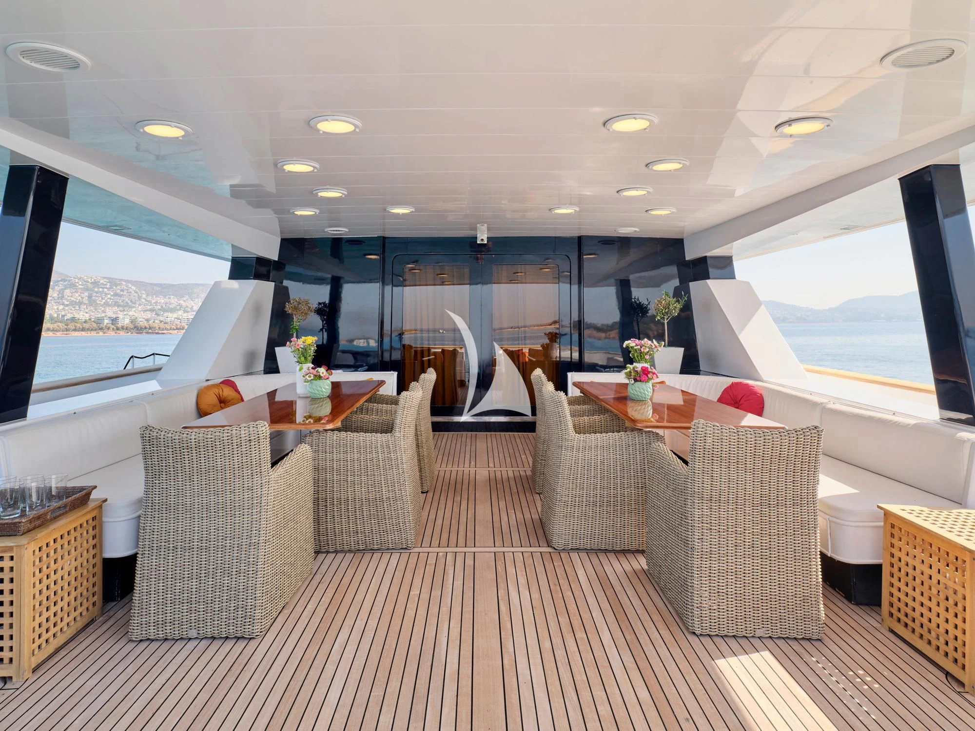 a large living room with a large window aboard LADY RINA Yacht for Sale
