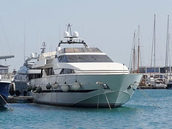 a large white boat in the water aboard LADY RINA Yacht for Sale