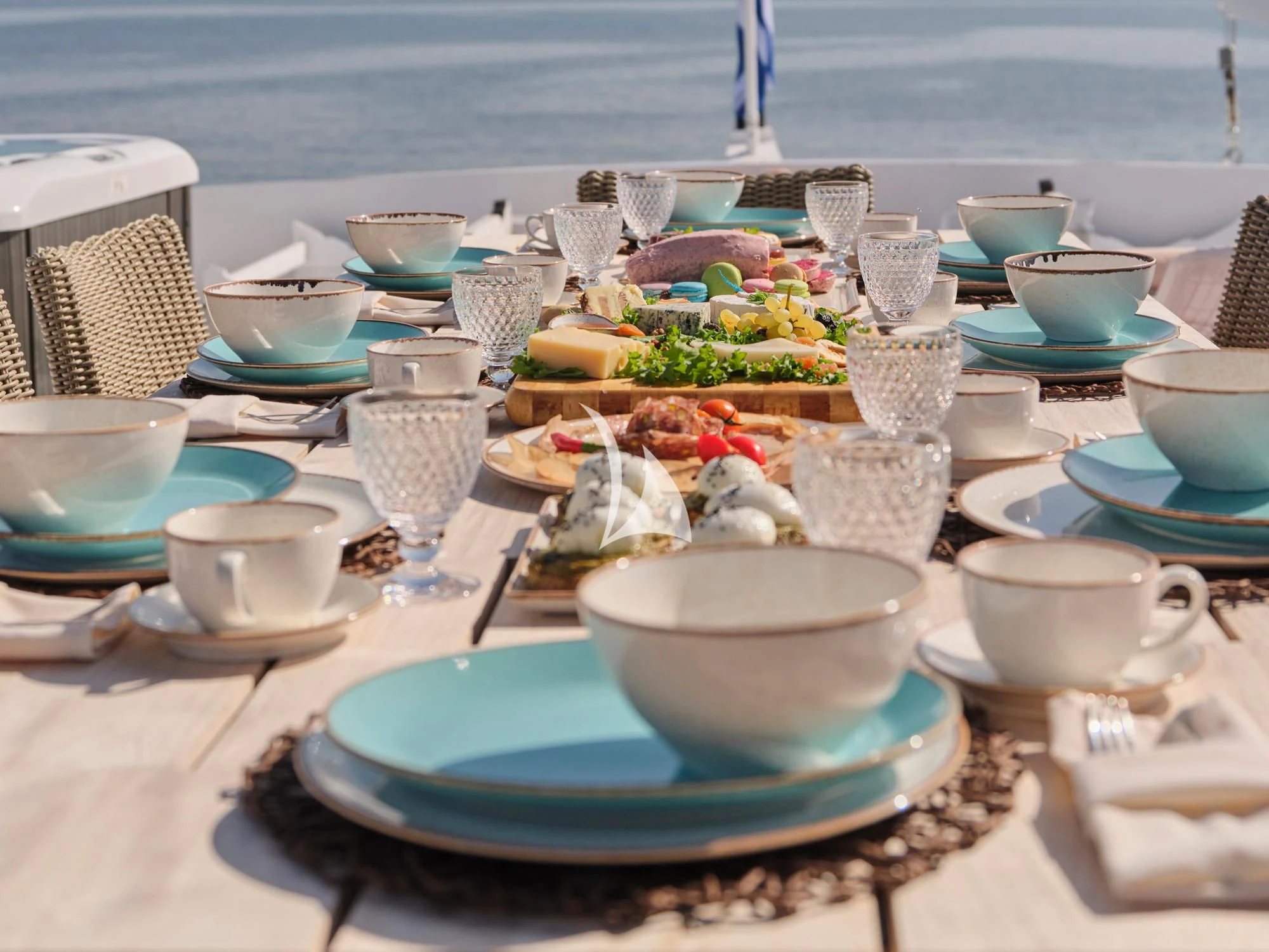 a table full of dishes aboard LADY RINA Yacht for Sale