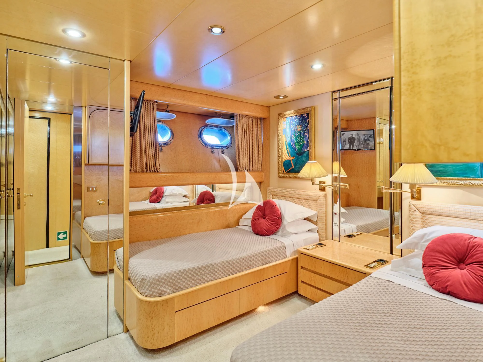 a room with a couple of beds aboard LADY RINA Yacht for Sale