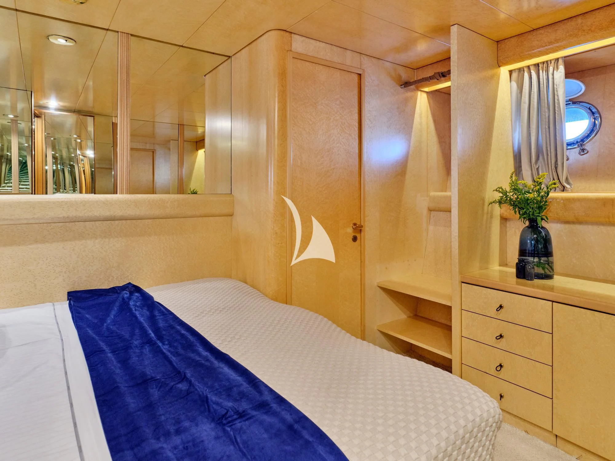 a bed in a room aboard LADY RINA Yacht for Sale