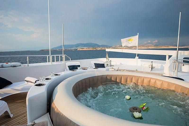 a large swimming pool aboard LADY RINA Yacht for Sale