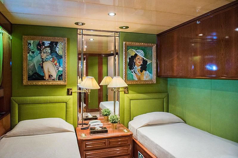 a room with a mirror and a bed aboard LADY RINA Yacht for Sale