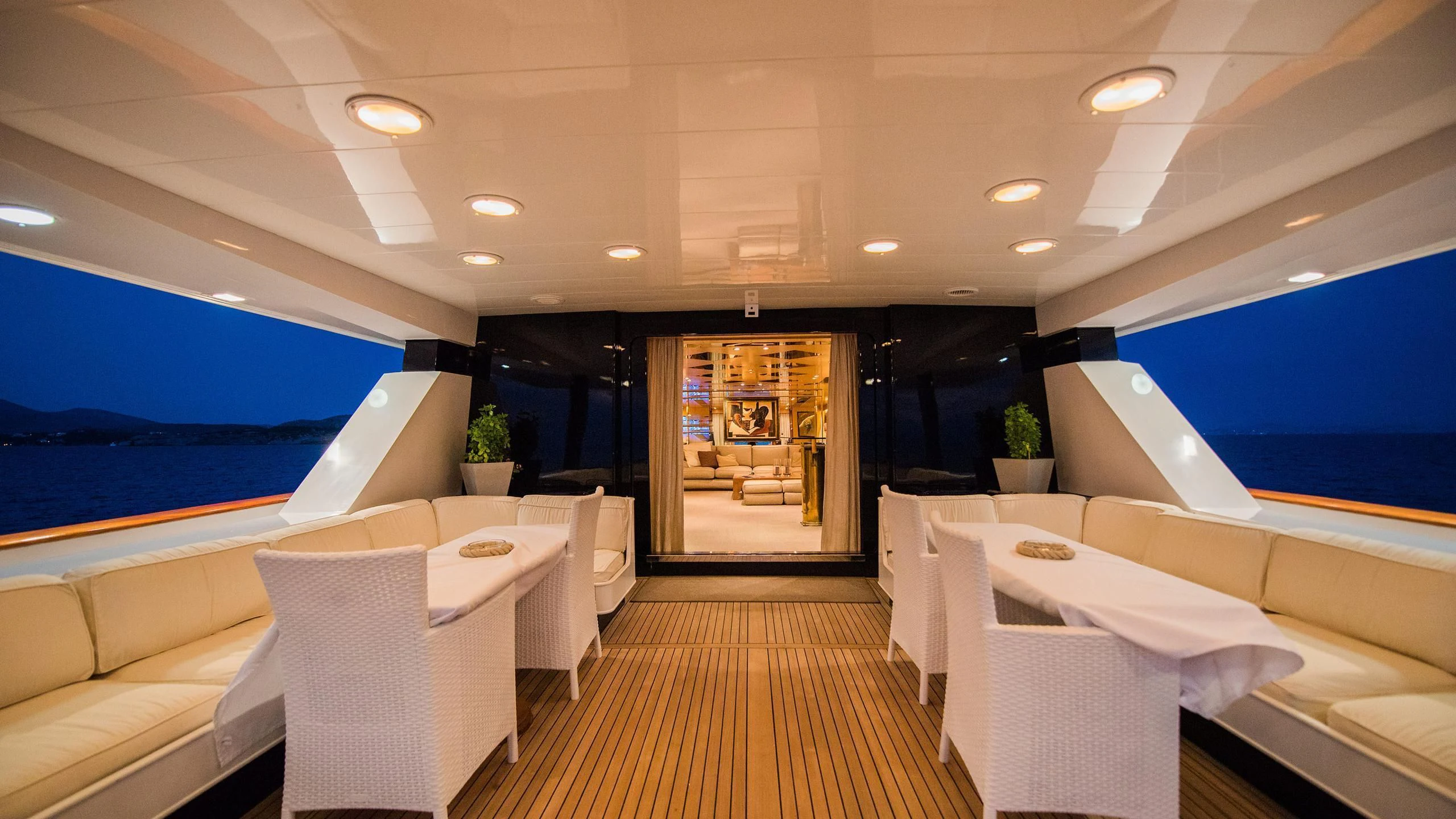 a room with a large bed and a large window aboard LADY RINA Yacht for Sale