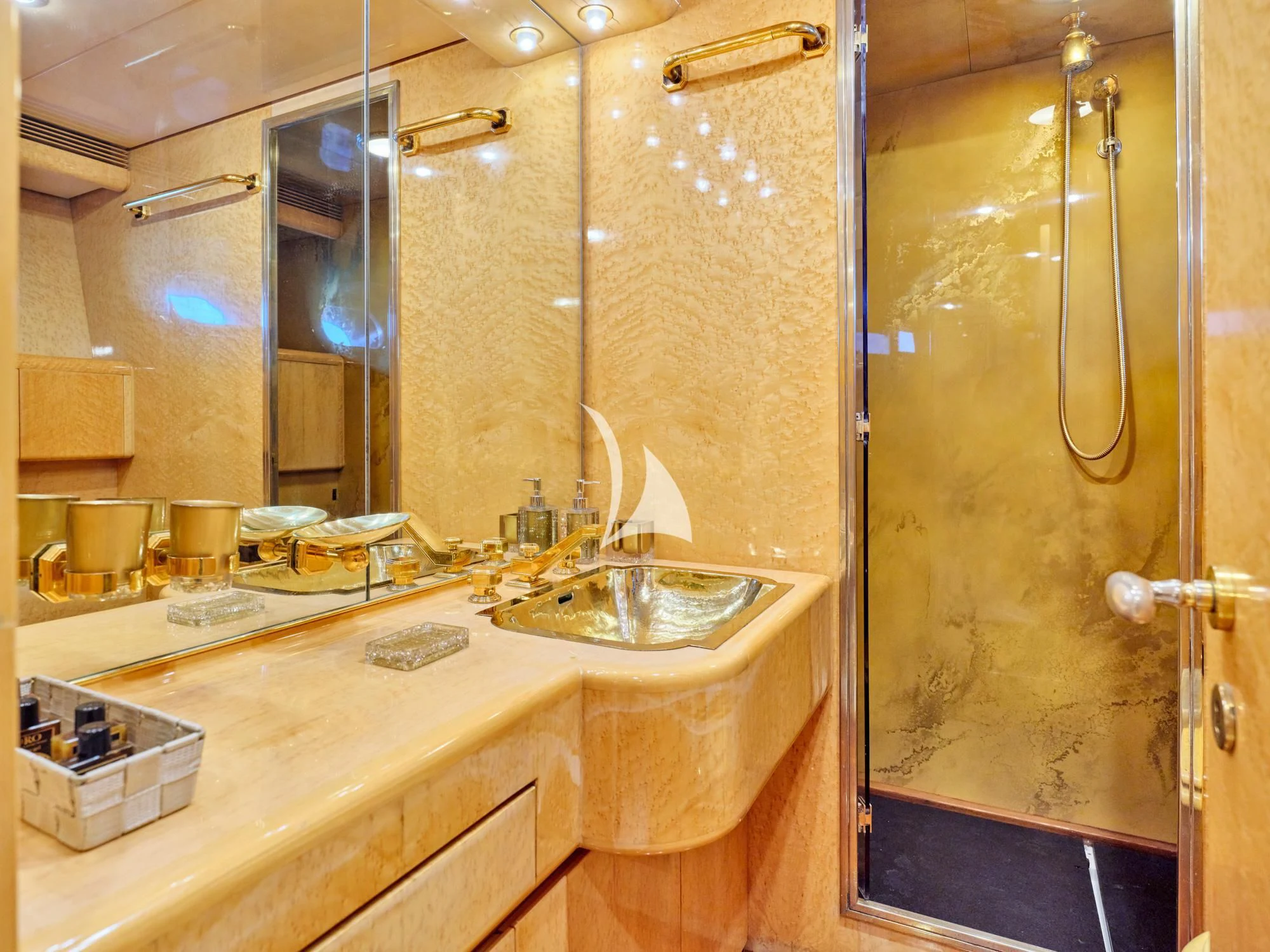 a bathroom with a large mirror aboard LADY RINA Yacht for Sale