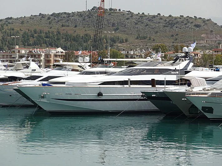a couple of boats in a harbor aboard LADY RINA Yacht for Sale