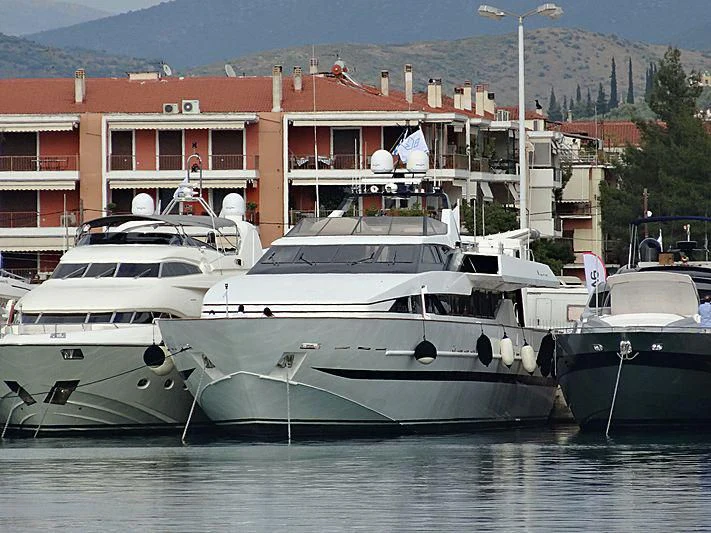 a group of boats sit in a harbor aboard LADY RINA Yacht for Sale