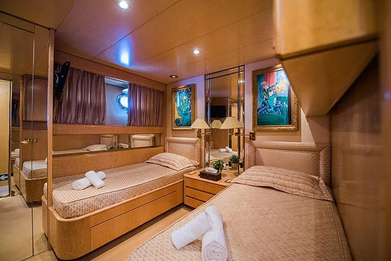 a room with two beds aboard LADY RINA Yacht for Sale