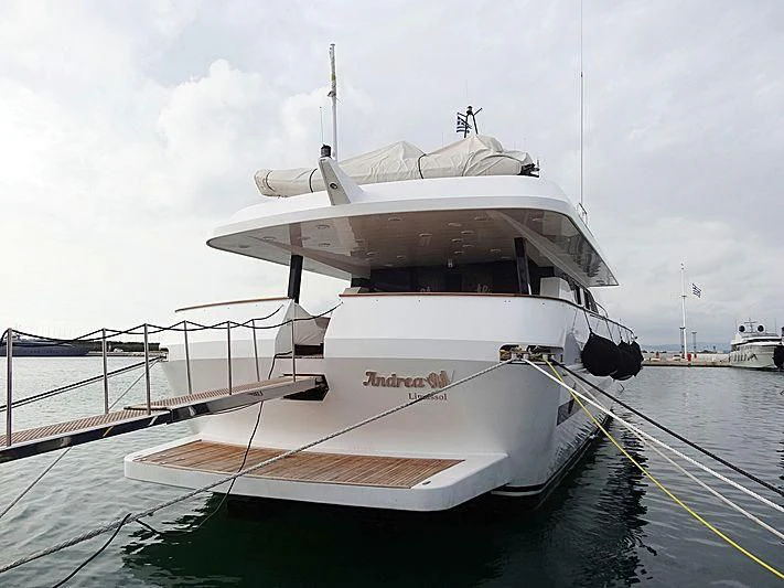 a large white boat aboard LADY RINA Yacht for Sale