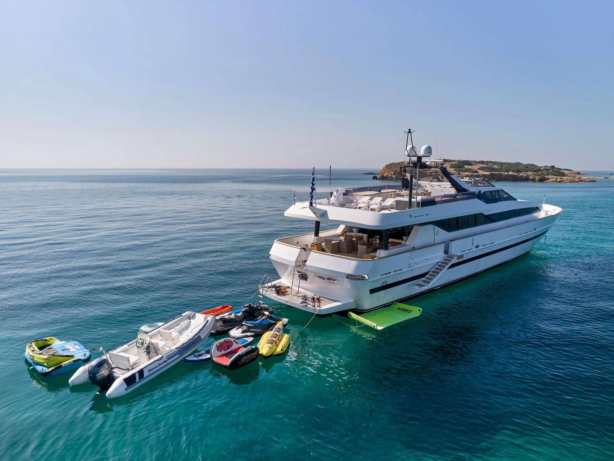 a boat and a boat in the water aboard LADY RINA Yacht for Sale