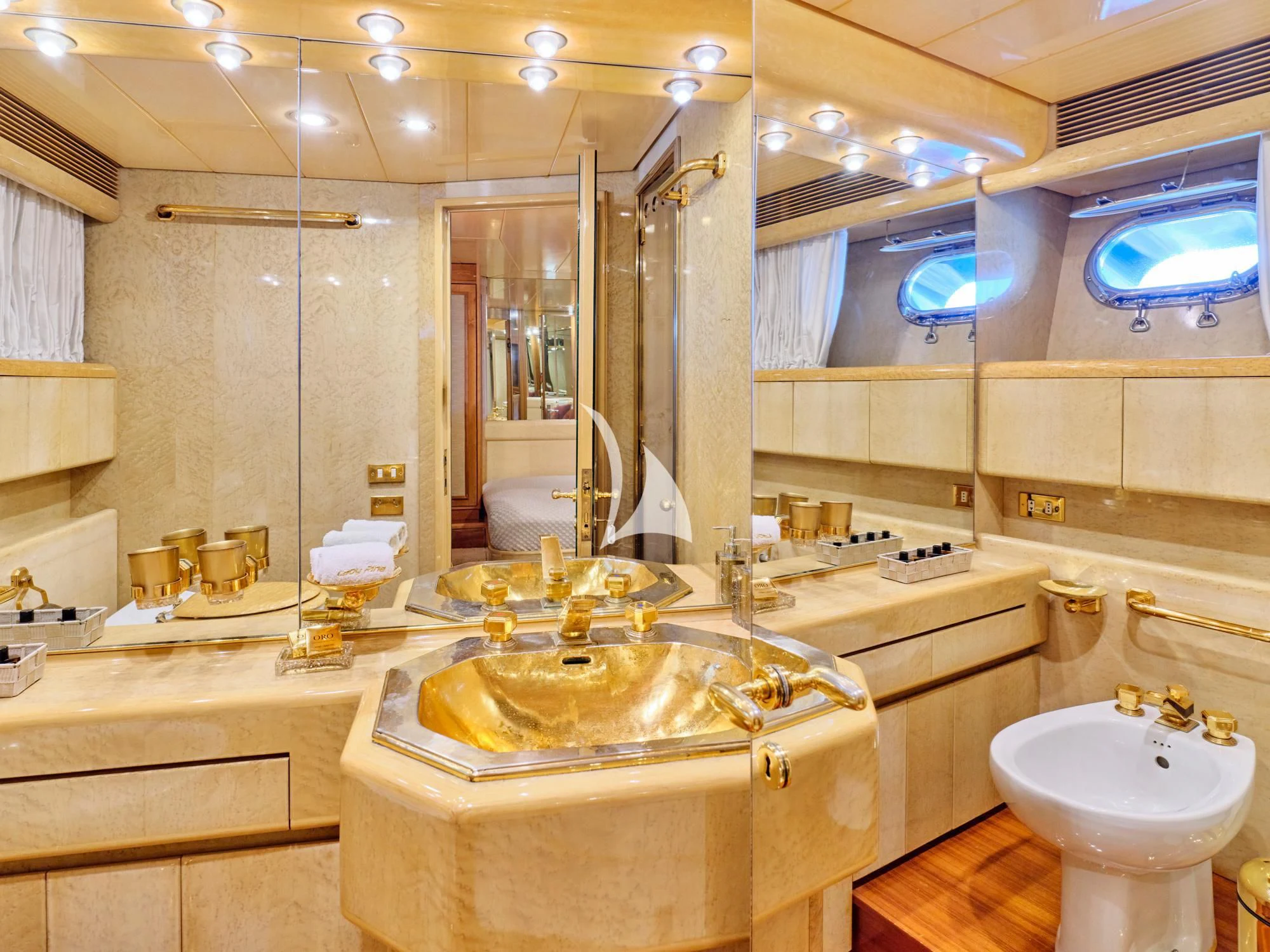 a bathroom with a large mirror aboard LADY RINA Yacht for Sale