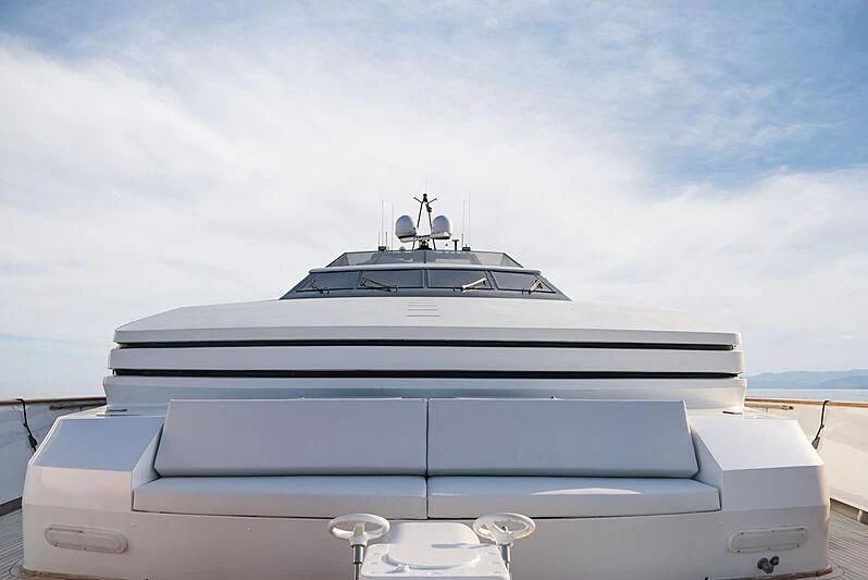 a white yacht on a dock aboard LADY RINA Yacht for Sale