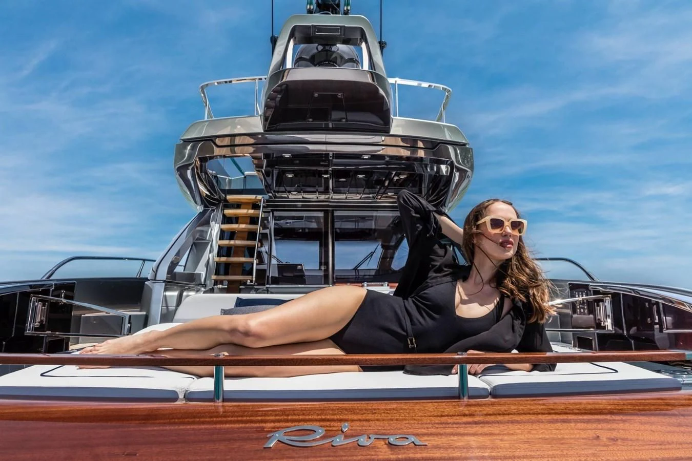 a person sitting on a boat aboard 66' RIBELLE Yacht for Sale