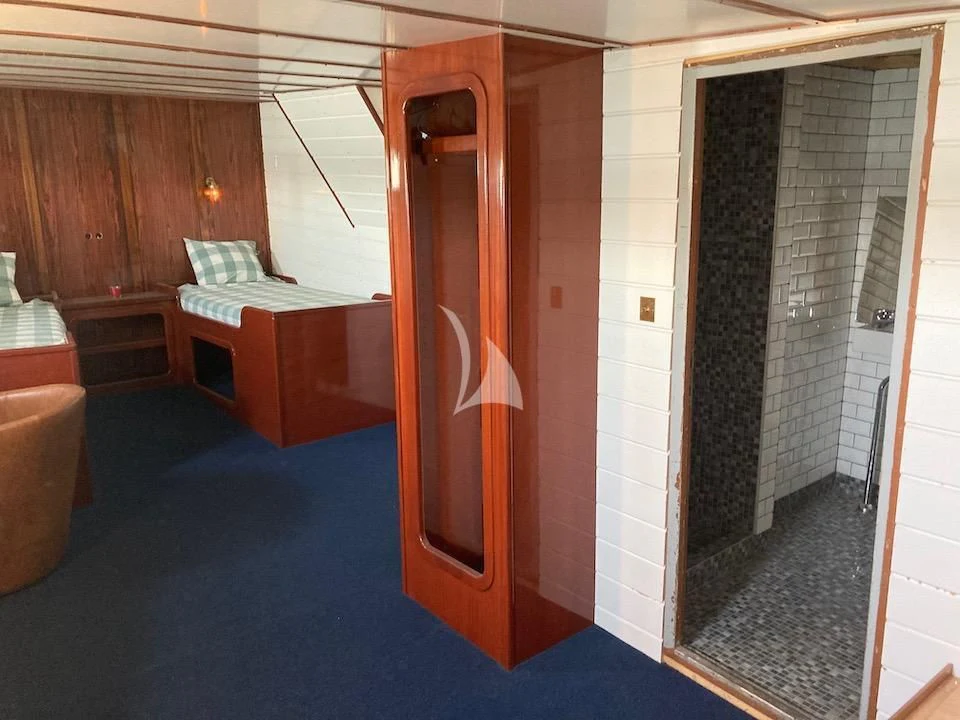 a room with a desk and a door aboard BALTO Yacht for Sale
