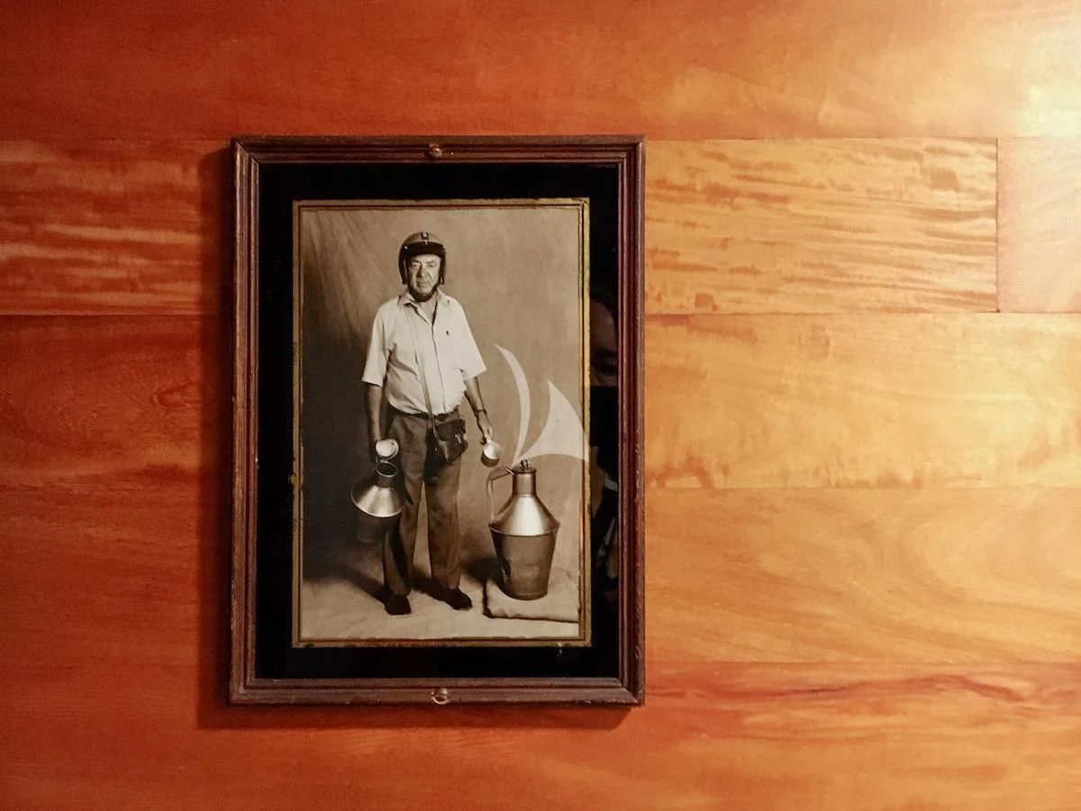 a framed picture of a person aboard BALTO Yacht for Sale