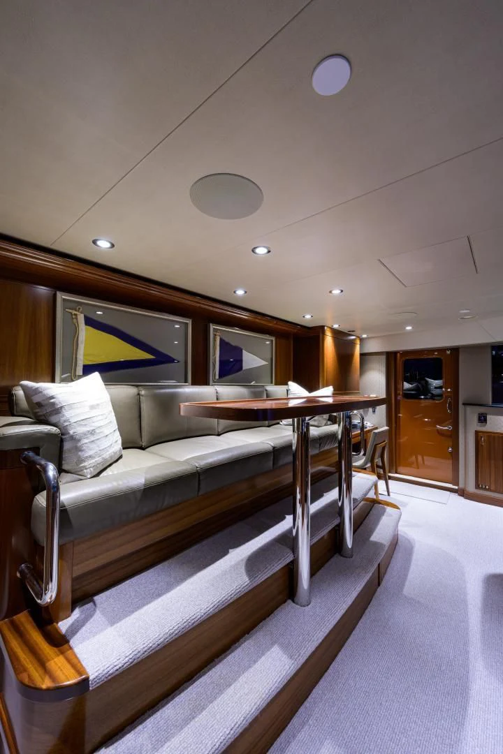 a couch in a room aboard LADY JJ Yacht for Charter