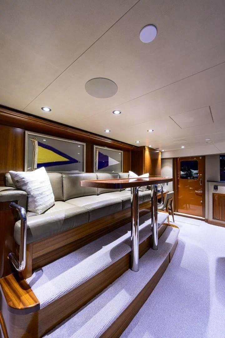a couch in a room aboard LADY JJ Yacht for Charter