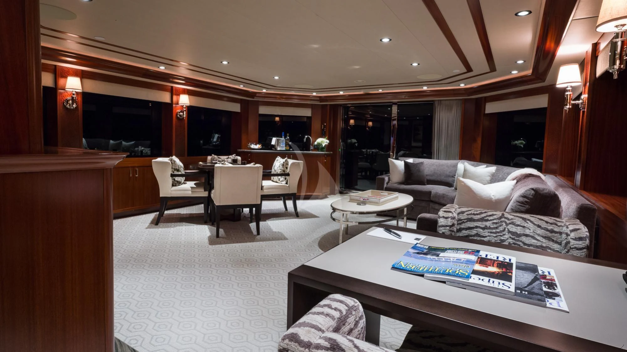 a living room with a couch and a table aboard LADY JJ Yacht for Charter
