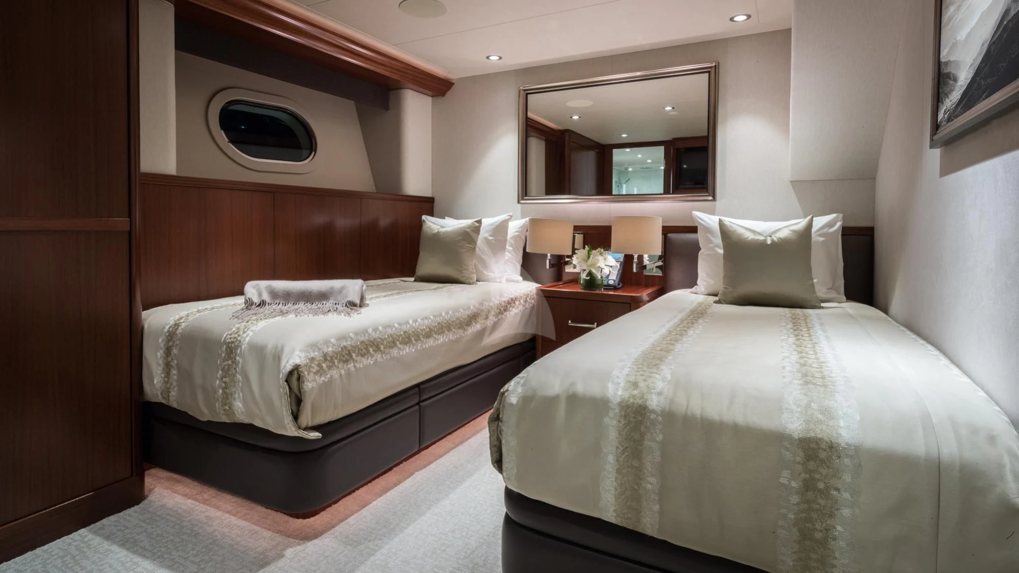 a couple of beds in a hotel room aboard LADY JJ Yacht for Charter